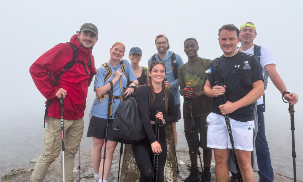 a group of hikers surrounded by fog